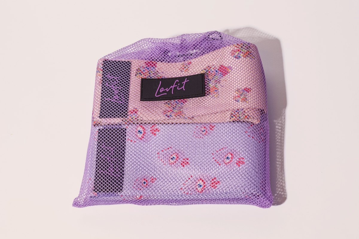 The three Lovfit bands in the lilac mesh bag